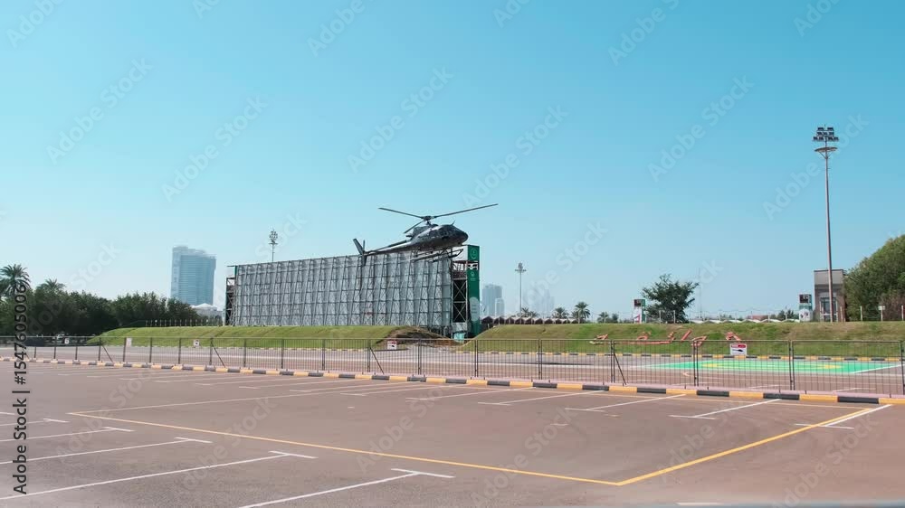 Flight of a small private helicopter with tourists to Dubai. Sunny summer day Flight of a small private helicopter with tourists to Dubai. Sunny summer day