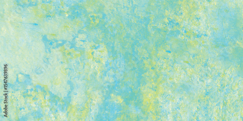 A watercolor textured surface depicting blended blues and greens suggesting an aquatic landscape or celestial display for creative projects