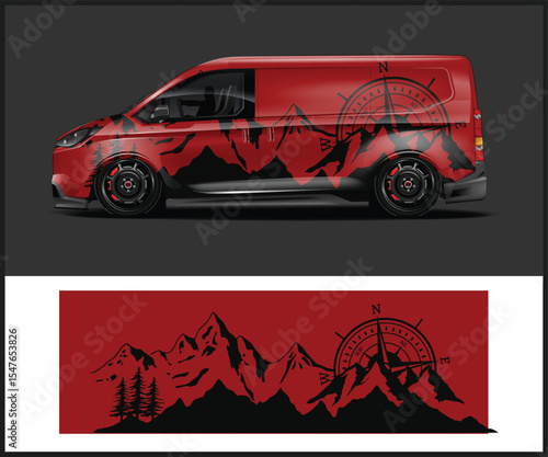 Red van with a striking mountain range graphic wrap design on its side
