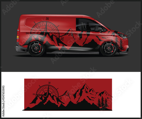 Red van with a striking mountain range graphic wrap design