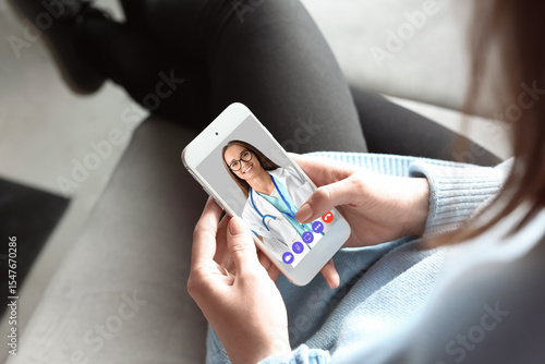 Woman using mobile phone in...