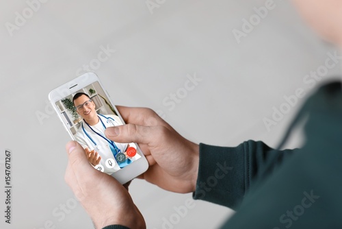 Man video chatting with doc...