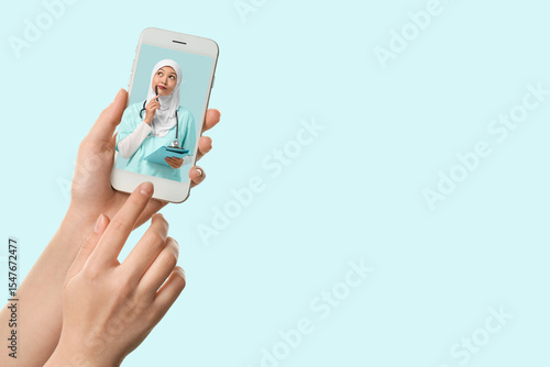 Female hands with mobile ph...