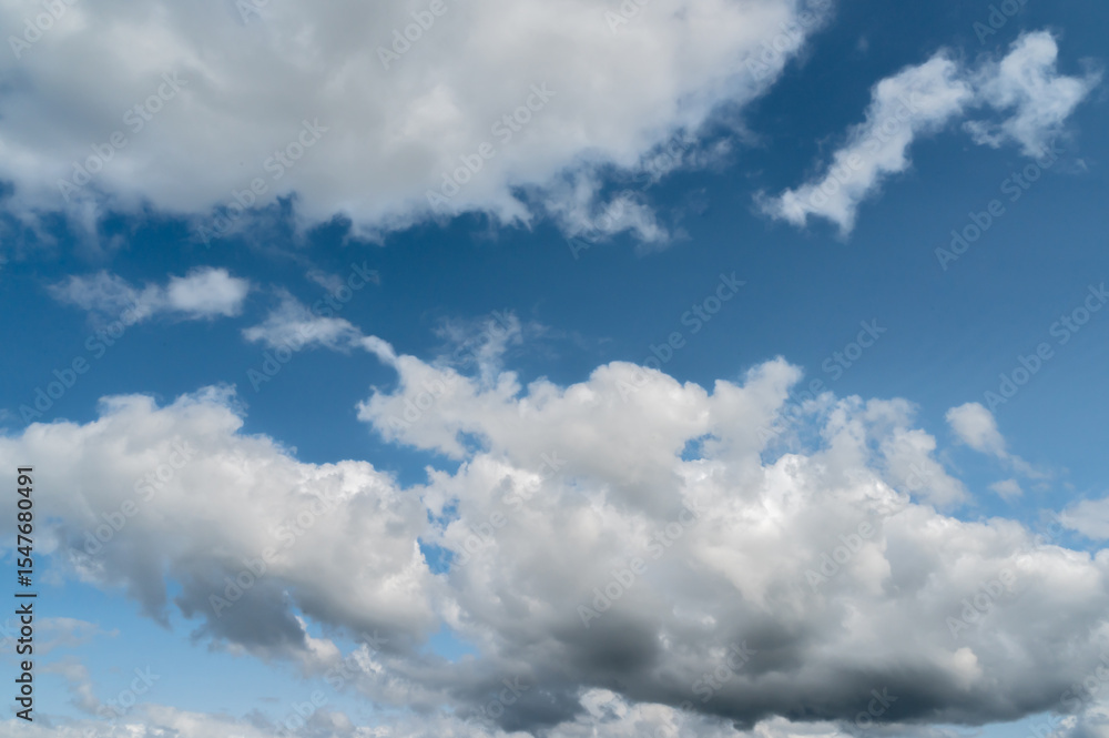 Dynamic Cloud Formation Set Against a Stunningly Bright Blue Sky on a Beautiful Day Dynamic Cloud Formation Set Against a Stunningly Bright Blue Sky on a Beautiful Day