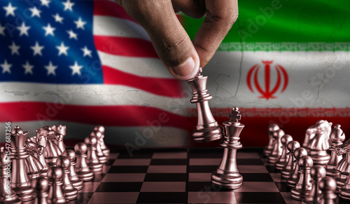 Iran vs USA flag on chessboard. Iran territory conflict. Political tension between USA and Iran