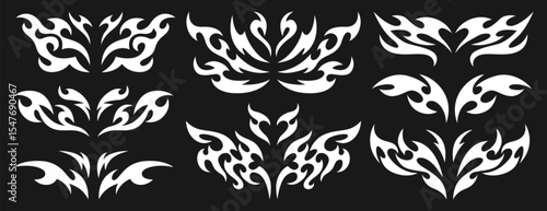 Vector set of neo tribal y2k tattoo. Neotribal dividers, symmetrical abstract shapes or cyber sigilism elements. White celtic gothic body ornaments. Emo butterfly stickers with wings and demon hearts.