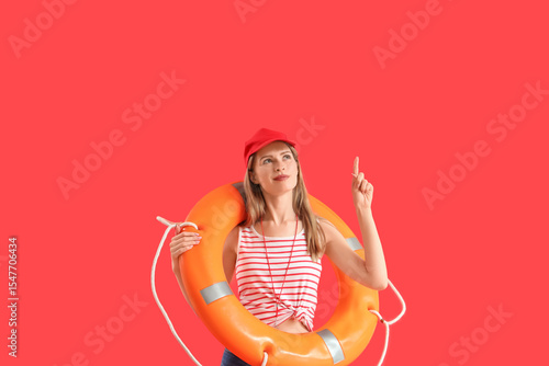 Young female lifeguard in c...