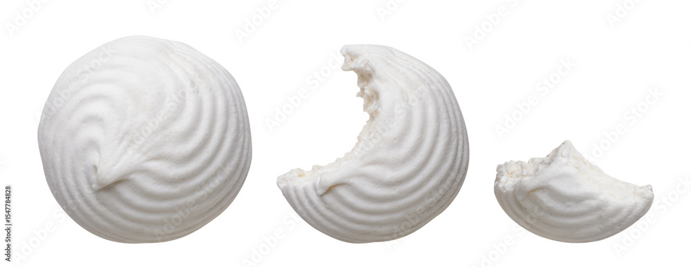 Round marshmallow and bitten pieces on a white background. Top view Round marshmallow and bitten pieces on a white background. Top view