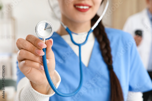 Female medical intern with ...