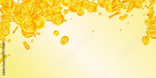 Thai baht coins falling. Gold scattered THB