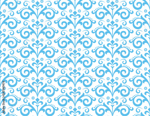 Wallpaper in the style of Baroque. White and blue floral ornament. Seamless vector background. Graphic pattern for fabric, wallpaper, packaging. Ornate Damask flower illustration