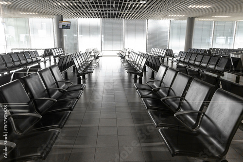 empty seats by the gate at the airport