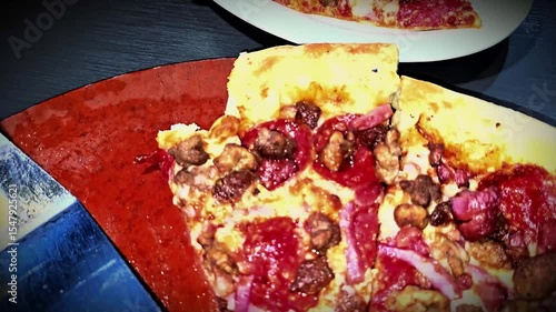 Delicious pizza featuring a combination of cheese and meat lovers toppings, served on a wooden board. The golden cheese stuffed crust