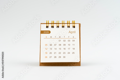 Wallpaper Mural April 2026 Mini desk calendar on white background. Torontodigital.ca
