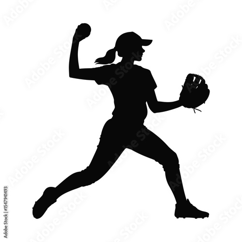 Silhouette of a Female Softball Player Pitching the Ball
