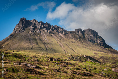 A summer HDR image of Stac Pollaidh, a popular mountain in the Inverpolly Nature reserve, Wester Ross, Scotland.