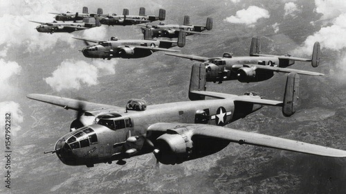 Historic WW2 Mitchell B-25 medium bombers flying in V-formation during military air mission, symbolizing vintage aviation, strategic air power and World War II combat history