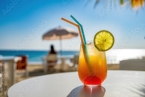 Tropical Summer Cocktail Beachside Orange Yellow Red Lime Garnish