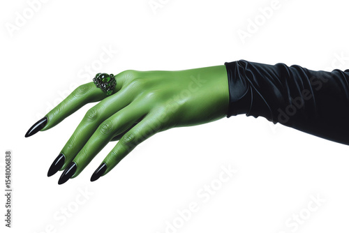 Green witch hand with long black fingernails and ornate ring extending from black sleeve against transparent background.