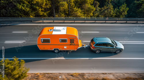 Orange Retro Caravan Being Towed on a Highway, Summer Road Trip Adventure