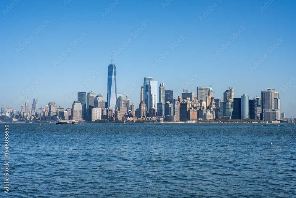 Obraz premium Lower Manhattan, New York City, with the famous World Trade Center seen from the Hudson River