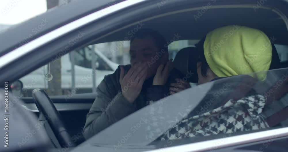 A man and woman on a road trip converse about plans, laugh, check directions on a tablet, and share playful, intimate moments, enhancing their adventure A man and woman on a road trip converse about plans, laugh, check directions on a tablet, and share playful, intimate moments, enhancing their adventure