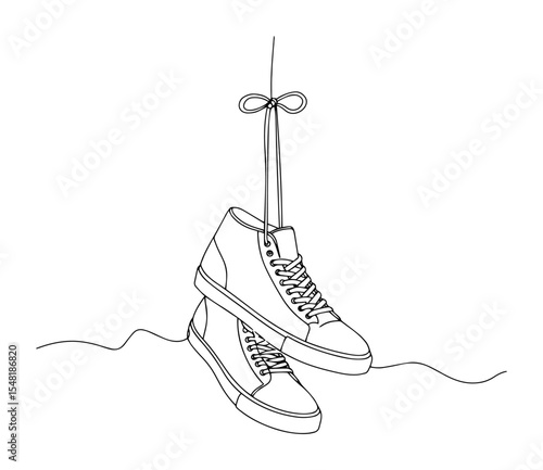hanging sneakers tied by laces – outline minimal concept