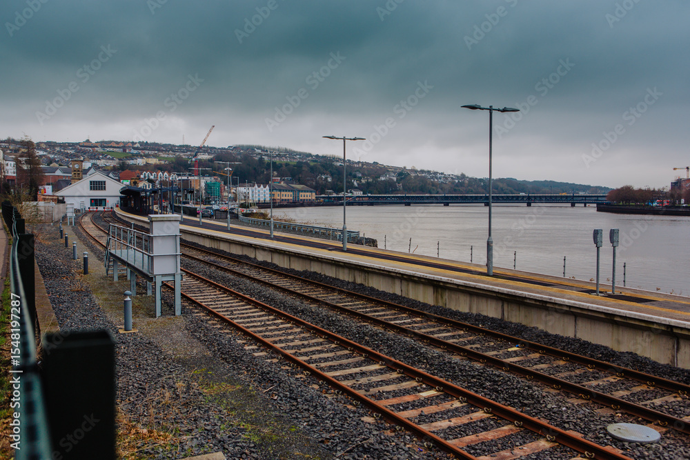 Fototapeta premium A view of the train tracks near Londonderry railway station, showing the railway infrastructure in the vicinity of the historic city