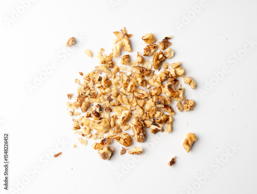 Chopped wallnut , broken roasted walnuts powder, heap of nuts crumbs, whole kernel pieces