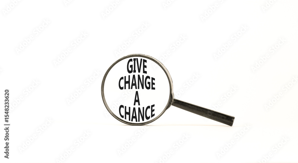 Give change a chance symbol. Concept words phrase Give change a chance in beautiful black magnifying glass. Beautiful white background. Business Give change a chance concept. Copy space. Give change a chance symbol. Concept words phrase Give change a chance in beautiful black magnifying glass. Beautiful white background. Business Give change a chance concept. Copy space.