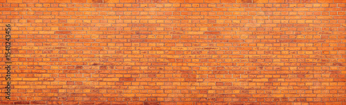 Orange brick wall forming a seamless background texture