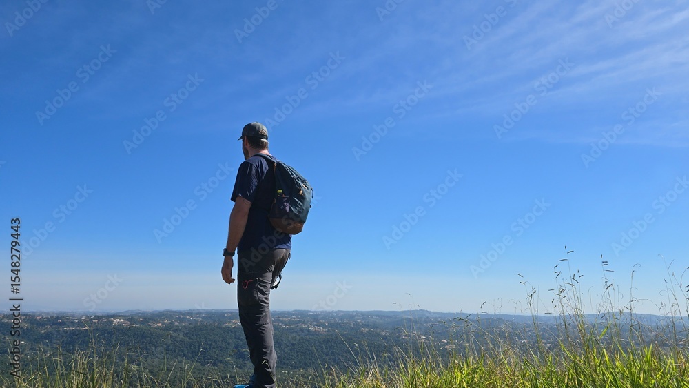 A man at the top of a mountain A man at the top of a mountain
