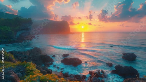 The sun rises over the ocean on Jeju Island with a soft golden color.