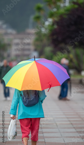 umbrella in the rain in the city of castro Urdiales in Spain