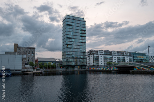 Canvas Print Dublin, Ireland - June 6 2025 Architecture during the golden our at Dockland's