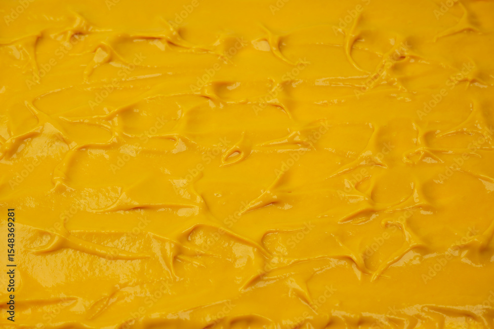Yellow sauce splashes as a background. Yellow sauce splashes as a background.