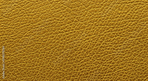 A close up shot displaying the intricate texture and patterns of a golden brown leather surface
