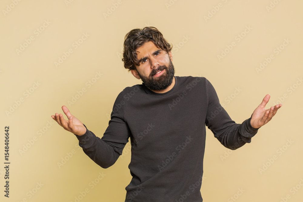 What Why. Sincere irritated Lebanese man raising hands in indignant expression asking reason of failure demonstrating disbelief irritation by trouble. Confused Indian Hindu guy on beige background What Why. Sincere irritated Lebanese man raising hands in indignant expression asking reason of failure demonstrating disbelief irritation by trouble. Confused Indian Hindu guy on beige background