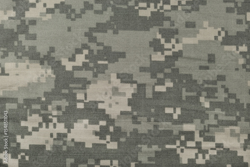 Universal camouflage pattern army combat uniform digital camo, US military ACU UCP closeup, horizontal natural ripstop fabric background, crumpled foliage green desert sand tan, urban grey NYCO swatch