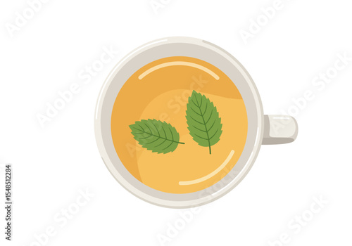 Overhead view of a cup with lightyellow liquid  two green leaves floating inside