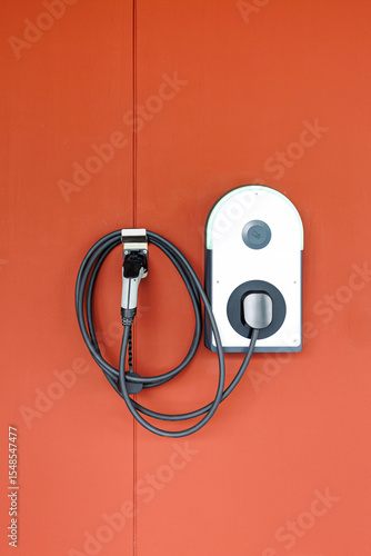 home charger installed inside home with power cable
