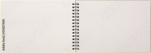 Tableau sur toile blank sketch book with metal spiral binding lying open isolated white background