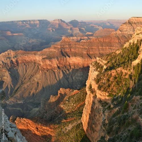 Panorama of the Grand Canyon in Arizona at sunset, showing the Colorado River from the South Rim. 