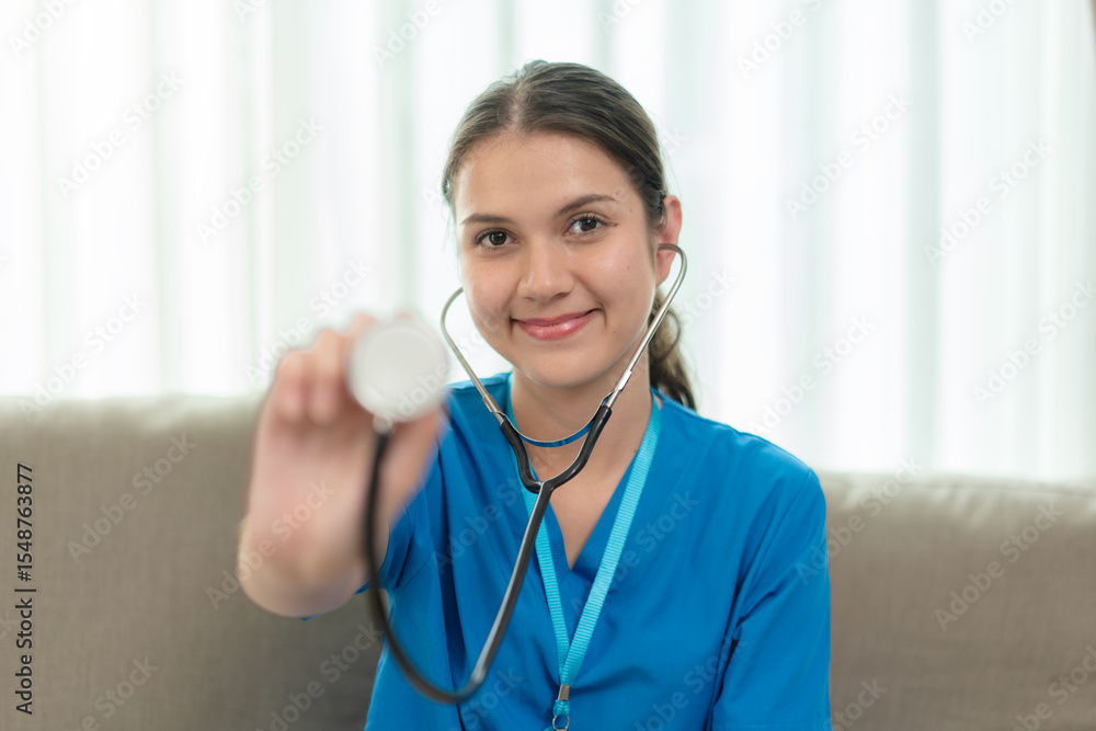 Confident female nurse smiling at camera Confident female nurse smiling at camera