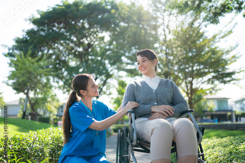 Nurse gently caring for senior patient