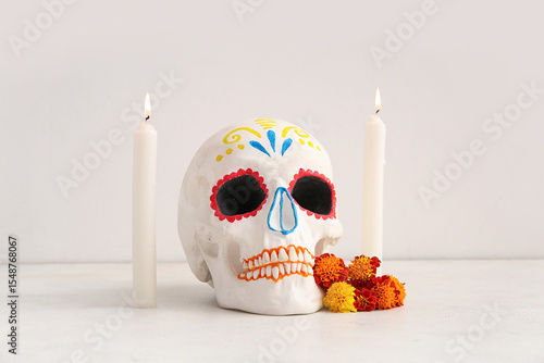 Candles with marigold flowe...