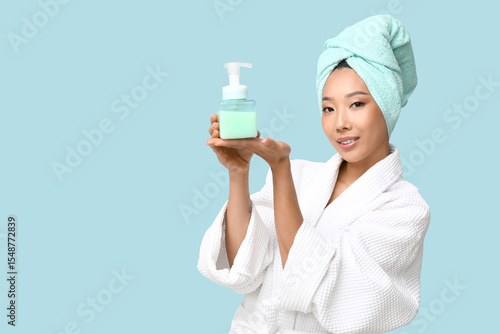 Young Asian woman with show...