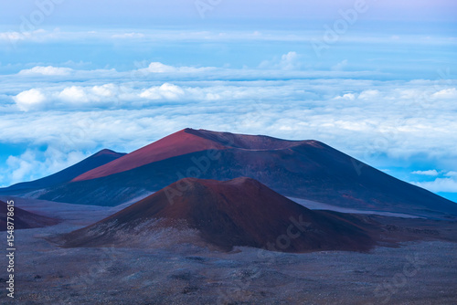 An elevated view from the summit of Mauna Kea on the Big Island of Hawaii, photographed above the clouds in one of the island’s most remote and scenic locations.