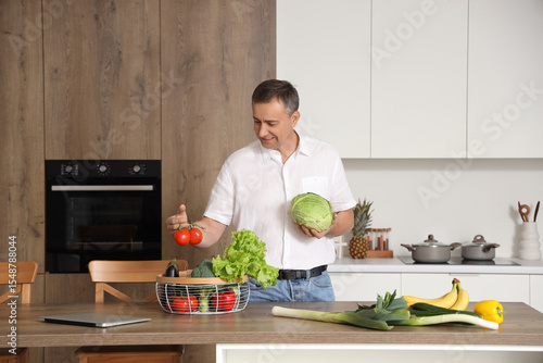 Mature man with basket of f...