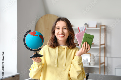 Female traveler with globe ...